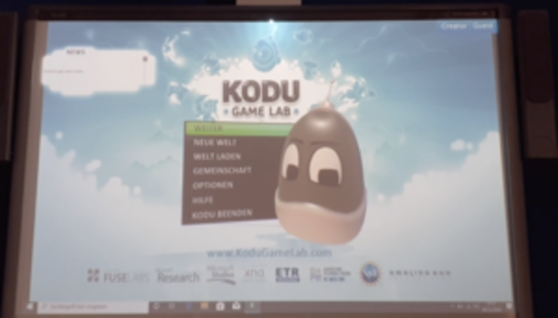 Startbildschirm des Programms Kodu Game Lab auf einer Projektionsfläche