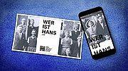 Karte und Smartphone mit Schriftzug Wer ist Hans vor blauem Hintergrund